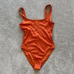 Float On one-piece in amber